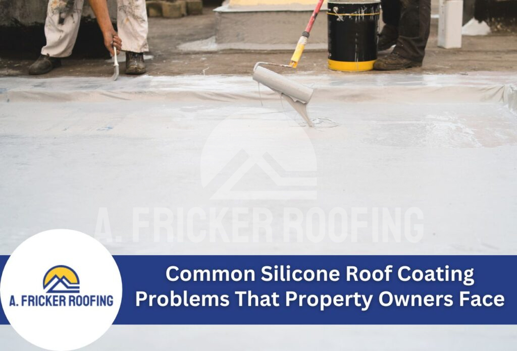 Worker applying silicone roof coating with paint roller on flat commercial roof