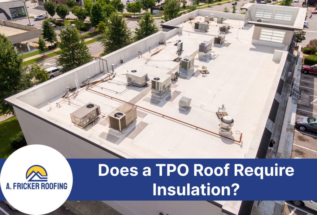 Aerial view of a commercial flat roof with tpo membrane and hvac units.