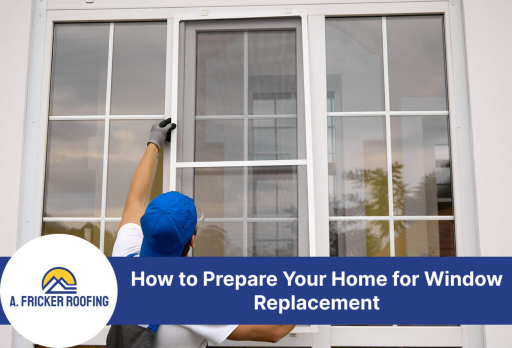 Worker installing a window frame during home renovation.