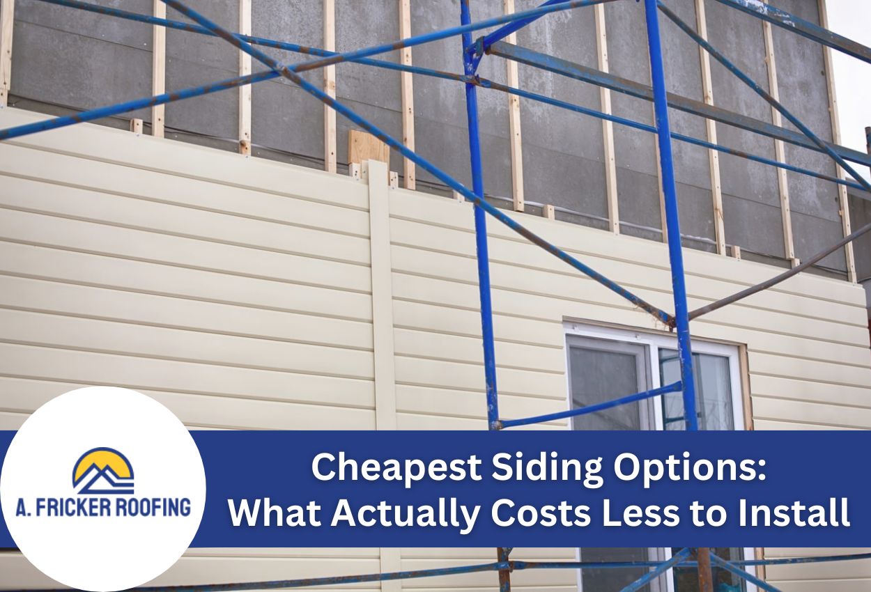 Scaffolding and siding installation on a building under construction.