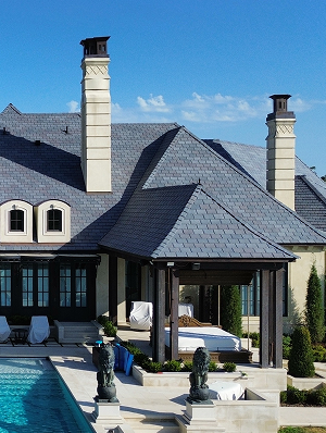 Luxury villa with poolside patio and stylish architecture.
